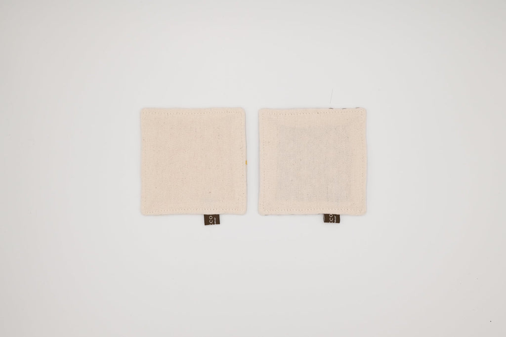 Two square coaster on a white background
