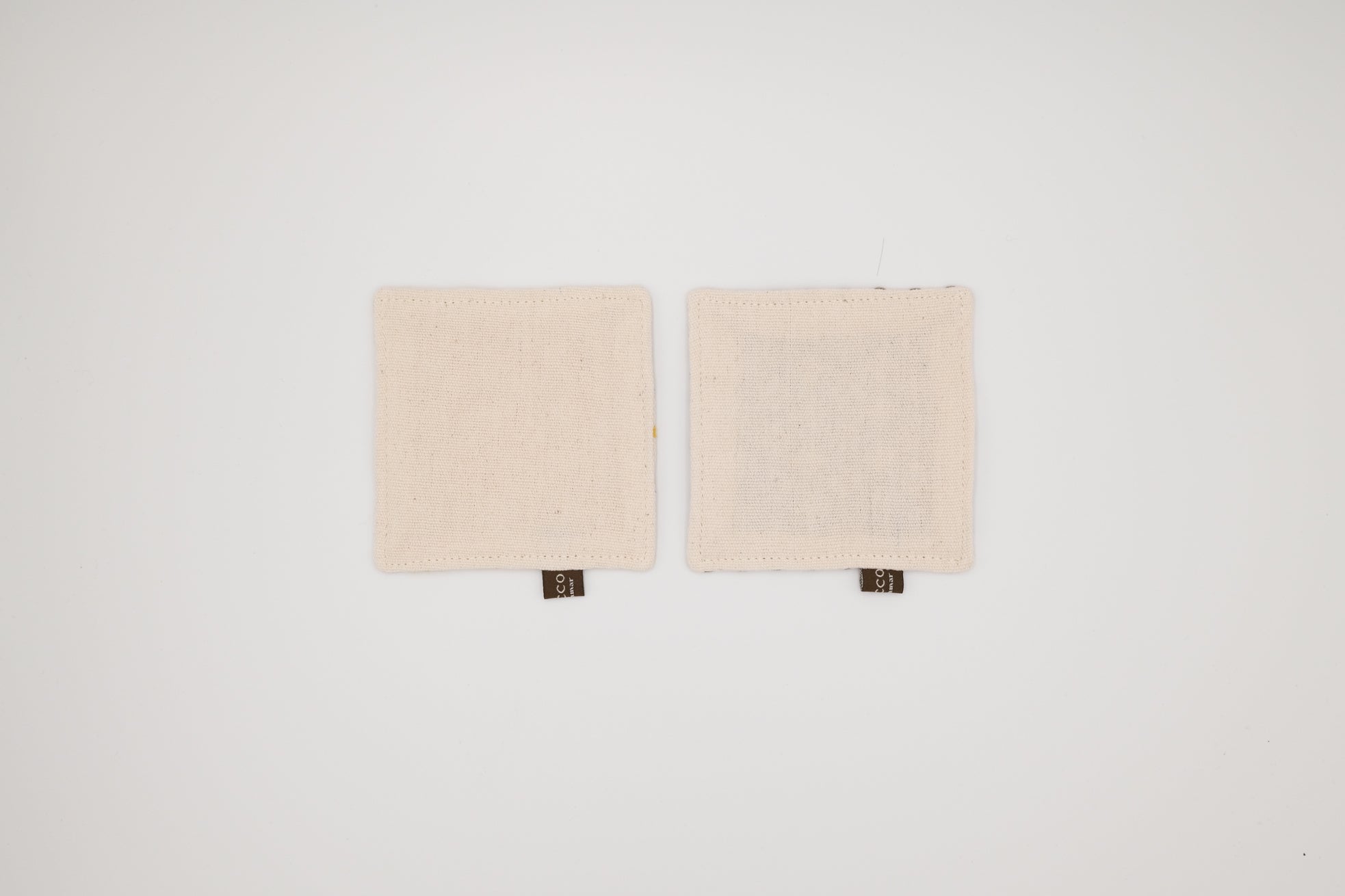 Two square coaster on a white background